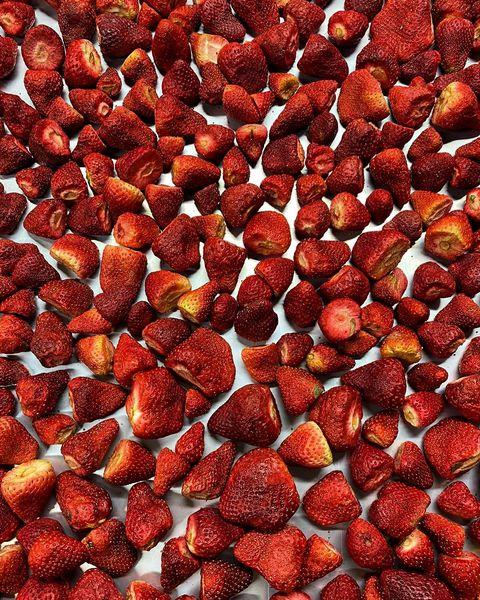 Cooking a batch of whole strawberries